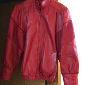 Red leather jacket , very soft leather and comfortable made oversized in arms.